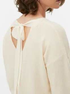Pull Tricoté Avec Nœud Dans Le Dos